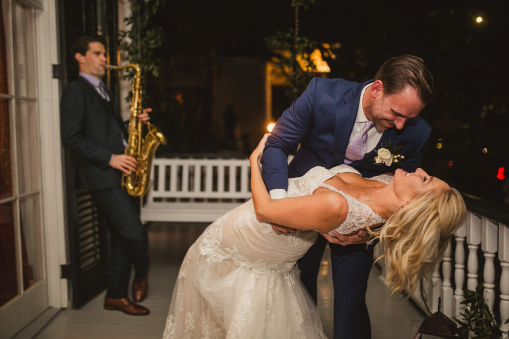 Couple dancing to live New Orleans band at wedding reception