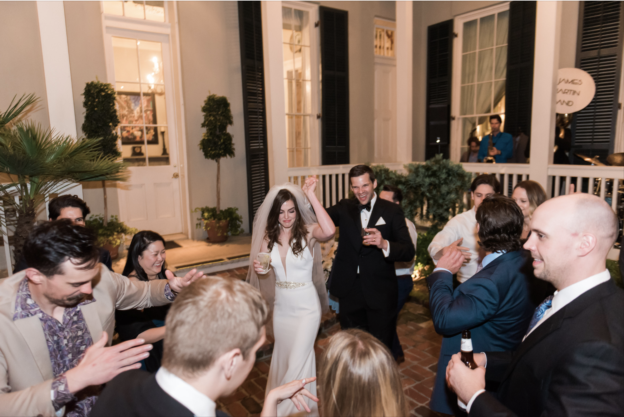 Bride and groom dancing during wedding reception with live band at Terrell House in New Orleans